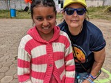 Jakelin with a student at Atahualpa school at Chaupiloma - June 3, 2023